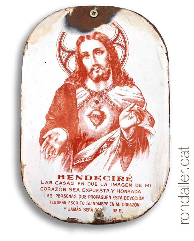 La imatge de Jesús en una placa del Sagrat Cor.